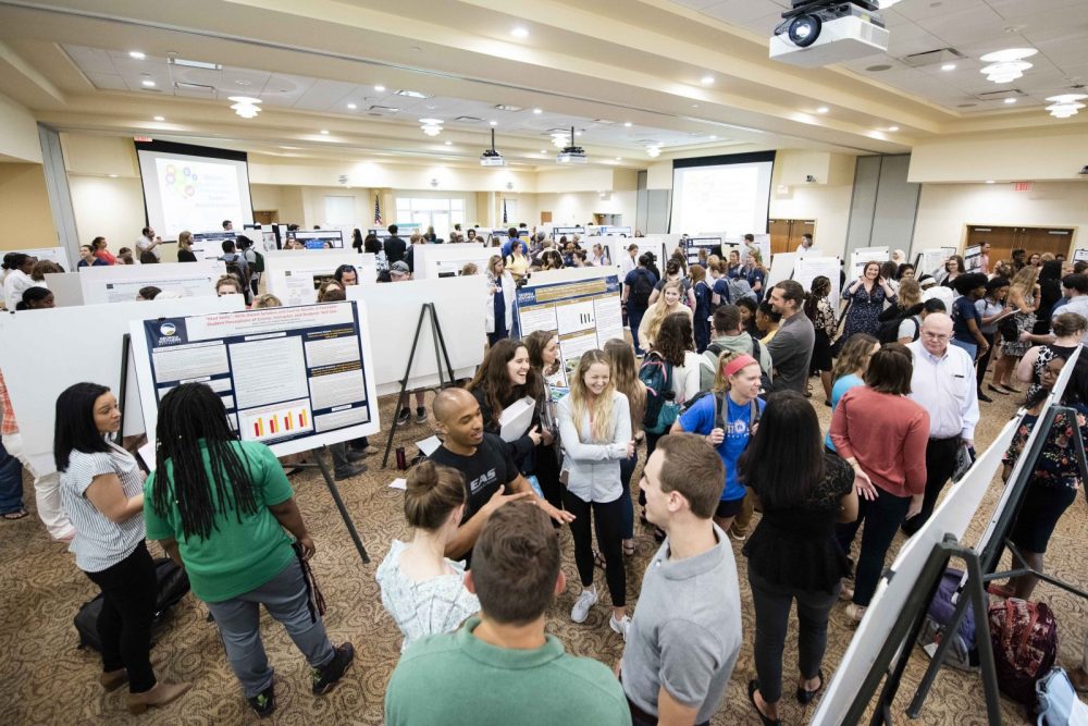 Students presenting research at Science fair